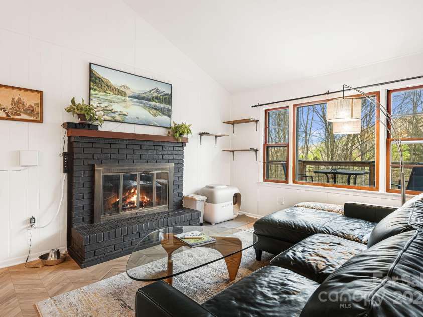 316 Rules Run Road, Clyde, NC 28721.  MLS# CAR4204518, YatesRealty ID 11733. Wood Fireplace