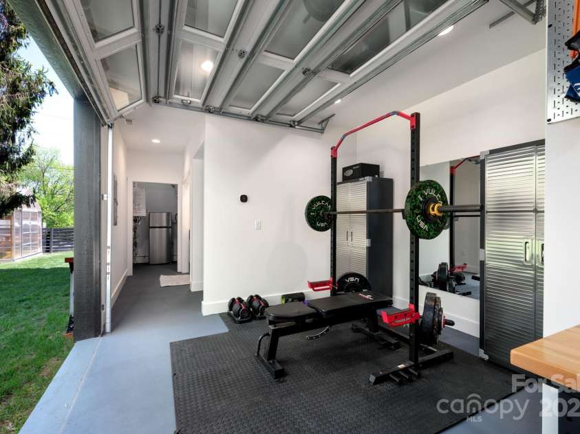 103 Pennsylvania Avenue, Asheville, NC 28806.  MLS# CAR4249512, YatesRealty ID 11734. Hallway Leading to Utility and Laundry Areas