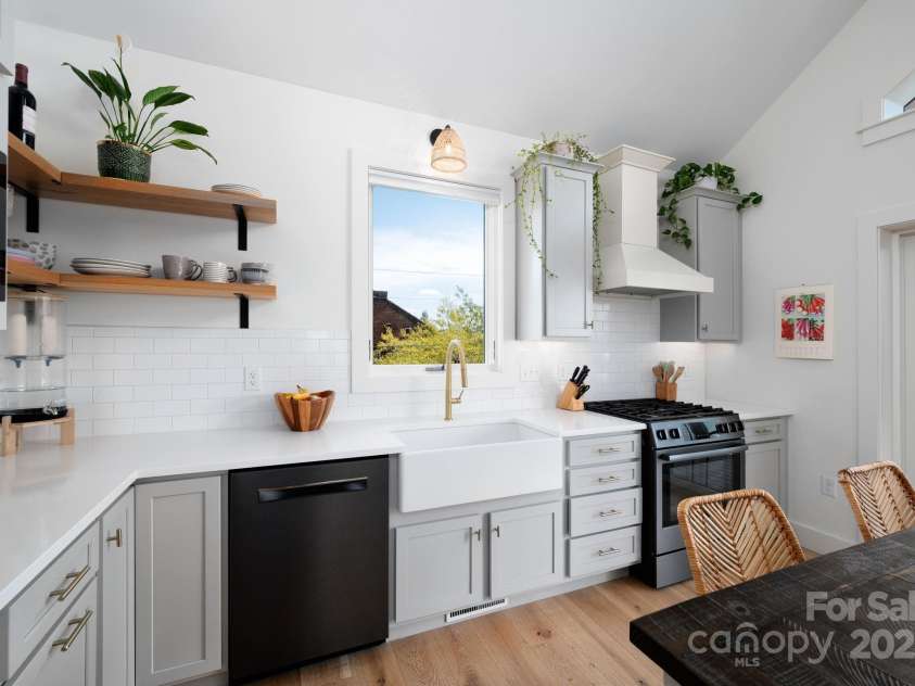 103 Pennsylvania Avenue, Asheville, NC 28806.  MLS# CAR4249512, YatesRealty ID 11734. Sleek White Contertops