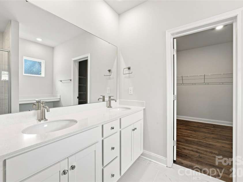 4050 Puddle Pond Road, Indian Trail, NC 28079.  MLS# CAR4370353, YatesRealty ID 11734. Primary Bathroom