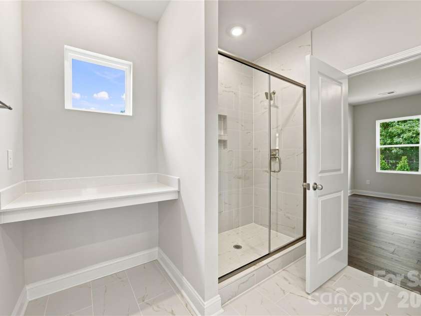 4050 Puddle Pond Road, Indian Trail, NC 28079.  MLS# CAR4370353, YatesRealty ID 11734. Primary Bathroom