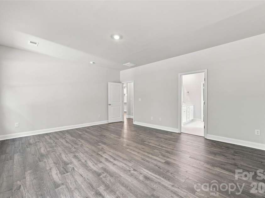 4050 Puddle Pond Road, Indian Trail, NC 28079.  MLS# CAR4370353, YatesRealty ID 11734. Primary Bedroom