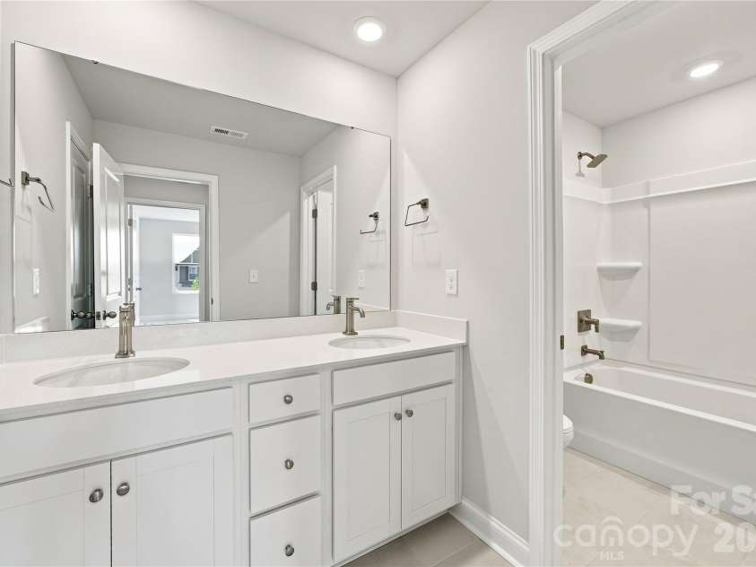 4050 Puddle Pond Road, Indian Trail, NC 28079.  MLS# CAR4370353, YatesRealty ID 11734. Upstair Hall Bath