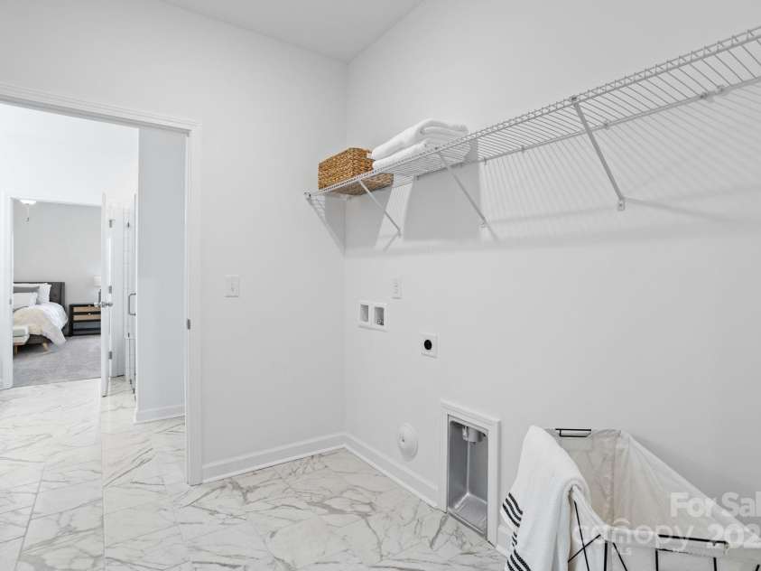 301 Beeson Court, Clemmons, NC 27012.  MLS# CAR4254777, YatesRealty ID 11740. Laundry with access from Owner's Bath