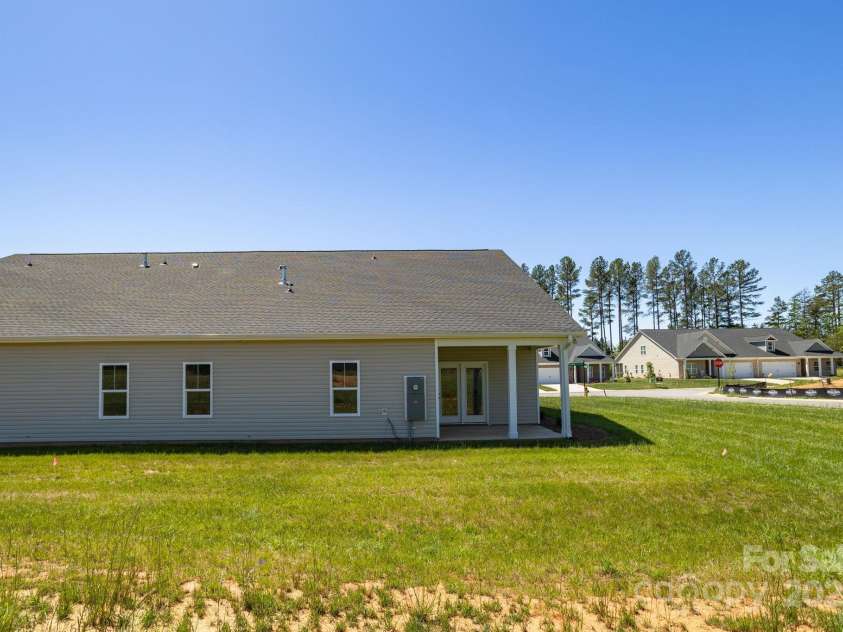 301 Beeson Court, Clemmons, NC 27012.  MLS# CAR4254777, YatesRealty ID 11740. Rear View
