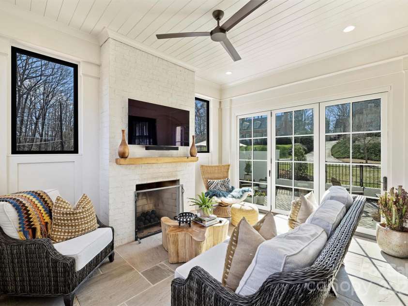 2509 Montrose Court, Charlotte, NC 28207.  MLS# CAR4228523, YatesRealty ID 11741. Fully Enclosed Sun Porch with Gas Fireplace
