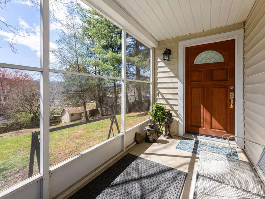 203 Pine Street, Candler, NC 28715.  MLS# CAR4357033, YatesRealty ID 11742. 