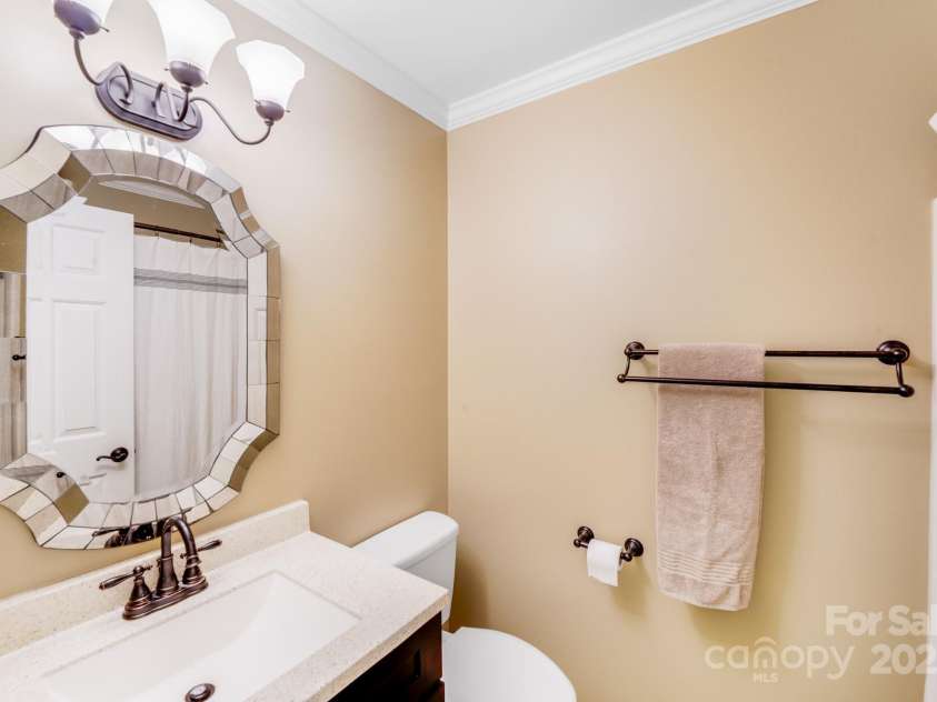 6910 Birdsong Lane, Waxhaw, NC 28173.  MLS# CAR4253788, YatesRealty ID 11745. Full bath located at the top of the stairs