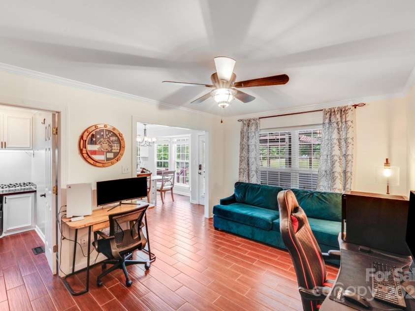 6910 Birdsong Lane, Waxhaw, NC 28173.  MLS# CAR4253788, YatesRealty ID 11745. Large family room / sitting area / office with media room closet