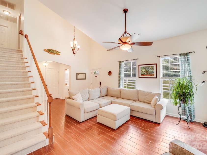 6910 Birdsong Lane, Waxhaw, NC 28173.  MLS# CAR4253788, YatesRealty ID 11745. Vaulted great room and two-story foyer