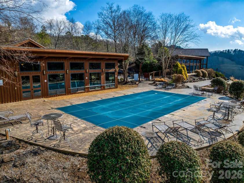 112 Moon Shadow Lane, Marshall, NC 28753.  MLS# CAR4332984, YatesRealty ID 1175. Clubhouse with fitness center, pool, hot tub, covered patio with fireplace and gathering places.