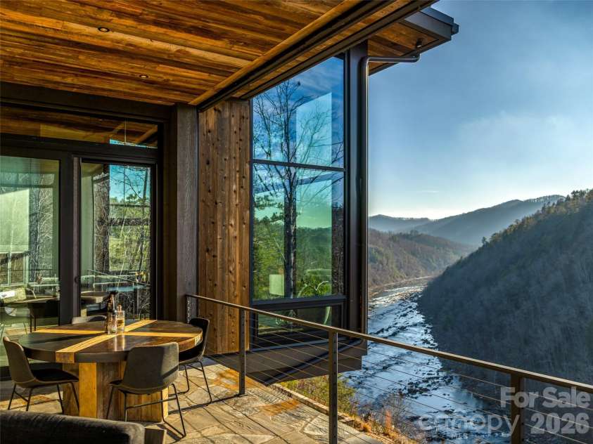112 Moon Shadow Lane, Marshall, NC 28753.  MLS# CAR4332984, YatesRealty ID 1175. Dine outside with the long range river and mountain views!