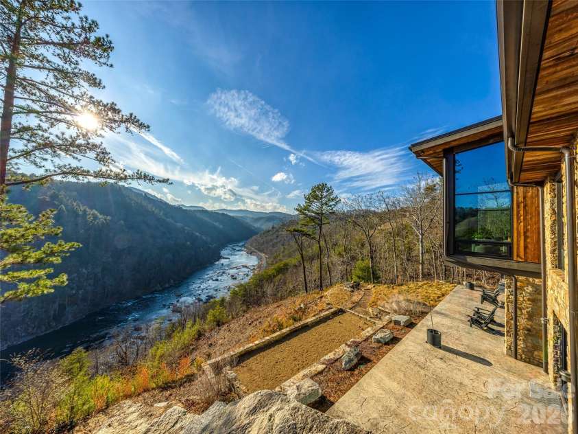 112 Moon Shadow Lane, Marshall, NC 28753.  MLS# CAR4332984, YatesRealty ID 1175. Low maintenance yard with native plants gives you time to enjoy this view and all the amenities the neighborhood offers.
