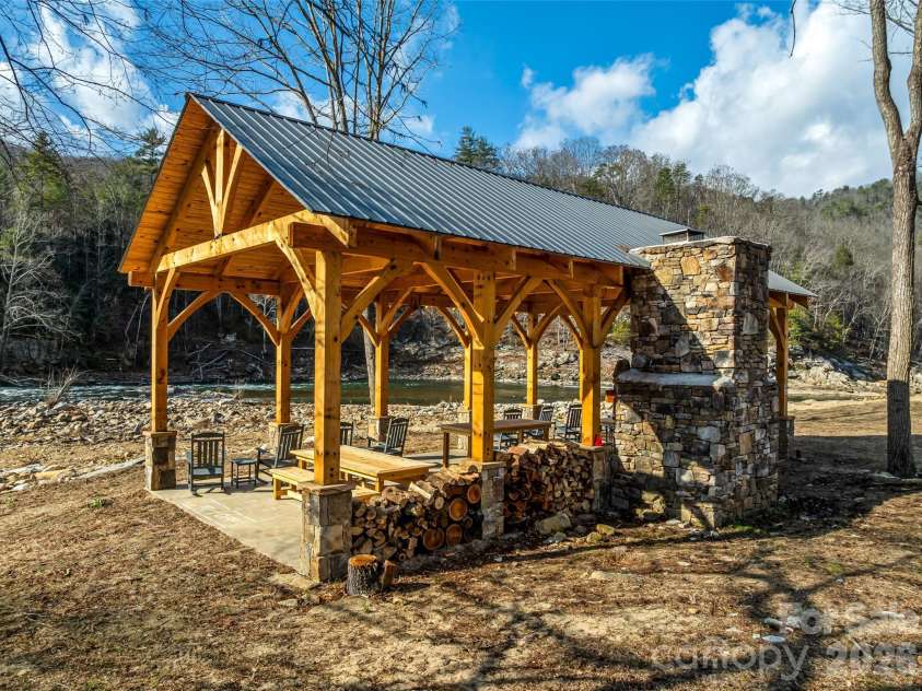 112 Moon Shadow Lane, Marshall, NC 28753.  MLS# CAR4332984, YatesRealty ID 1175. Relax at the River Park pavilion to enjoy the views and the sounds of the river and watch kayakers paddle by.