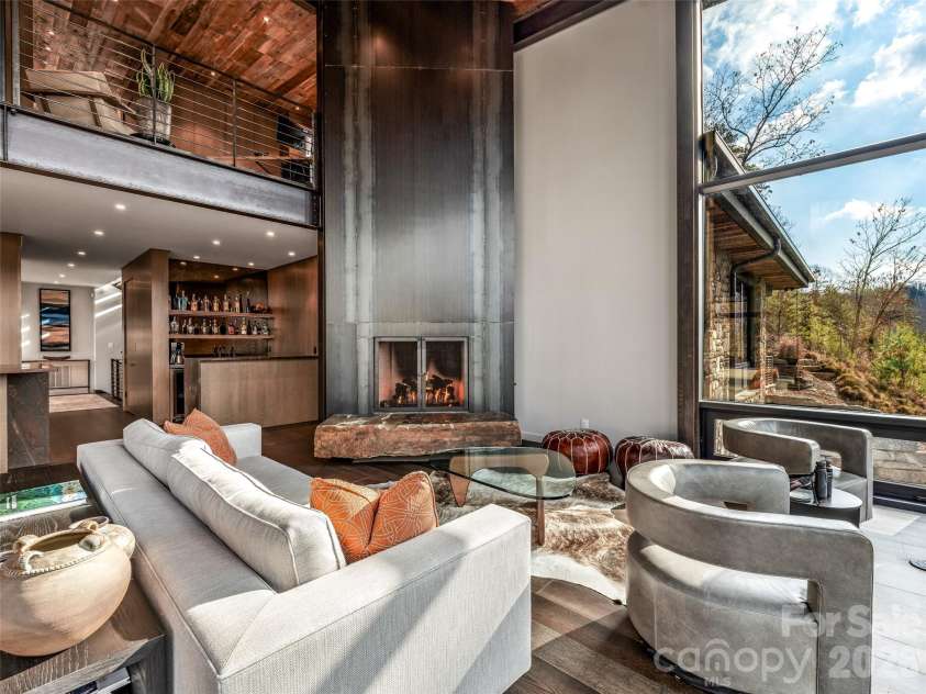 112 Moon Shadow Lane, Marshall, NC 28753.  MLS# CAR4332984, YatesRealty ID 1175. Wet bar off kitchen and great room with the elevator for all three levels. Loft/office area with views!