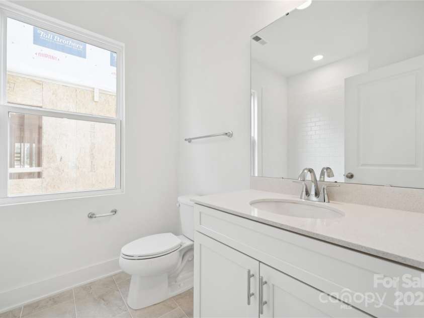 6007 Moonglade Lane, Charlotte, NC 28269.  MLS# CAR4326044, YatesRealty ID 11752. Secondary bath 