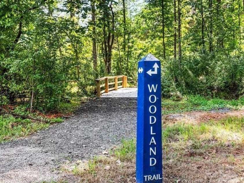 5107 Mint Harbor Way, Charlotte, NC 28269.  MLS# CAR4326148, YatesRealty ID 11754. Enjoy over 5 miles of scenic walking trails woven throughout the community.