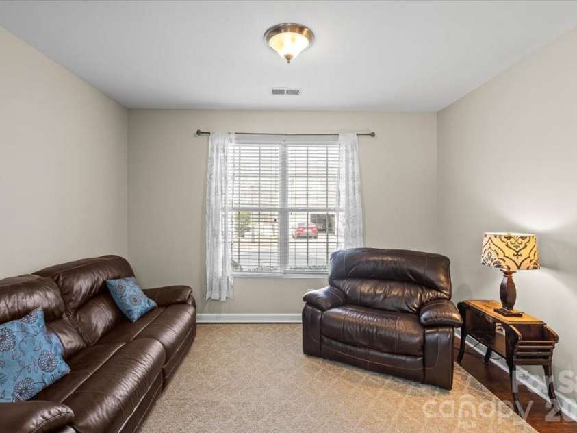 17211 Caldwell Track Drive, Huntersville, NC 28078.  MLS# CAR4357369, YatesRealty ID 11755. Front room, flex space