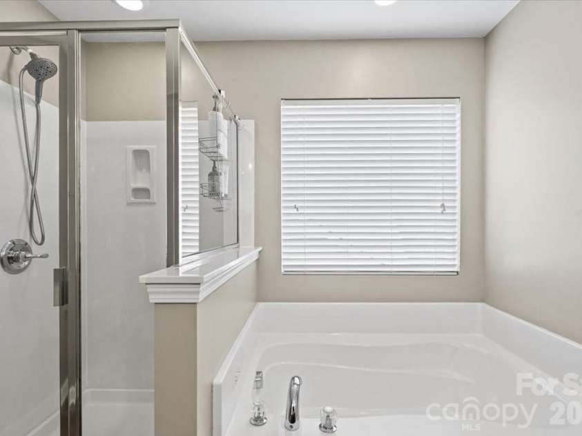 17211 Caldwell Track Drive, Huntersville, NC 28078.  MLS# CAR4357369, YatesRealty ID 11755. Primary bathroom