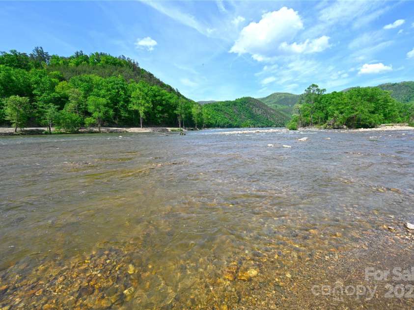 150 Easy Street, Hot Springs, NC 28743.  MLS# CAR4257068, YatesRealty ID 11759. French Broad River