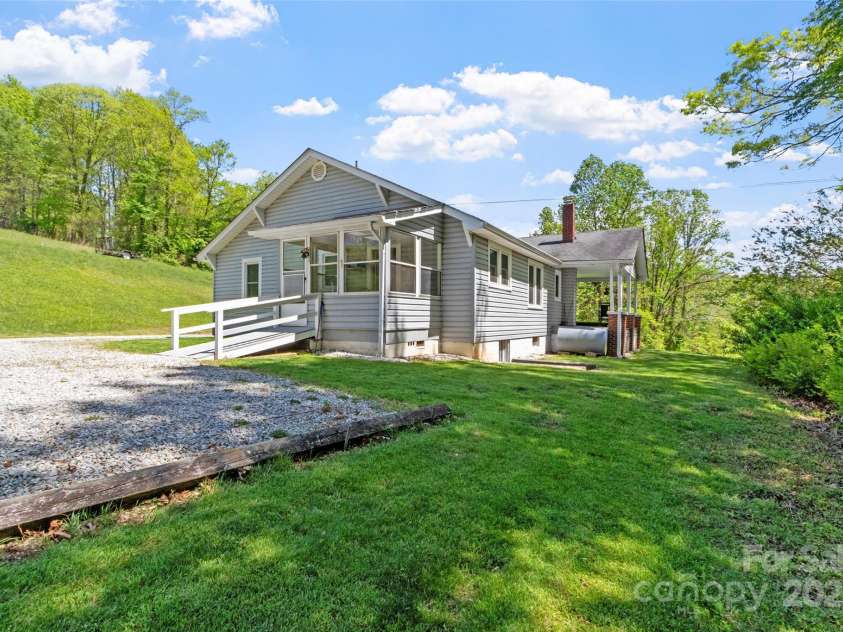 43 Charter Way, Burnsville, NC 28714.  MLS# CAR4256306, YatesRealty ID 11763. Back view of home