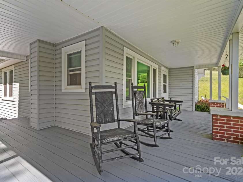 43 Charter Way, Burnsville, NC 28714.  MLS# CAR4256306, YatesRealty ID 11763. Covered front porch
