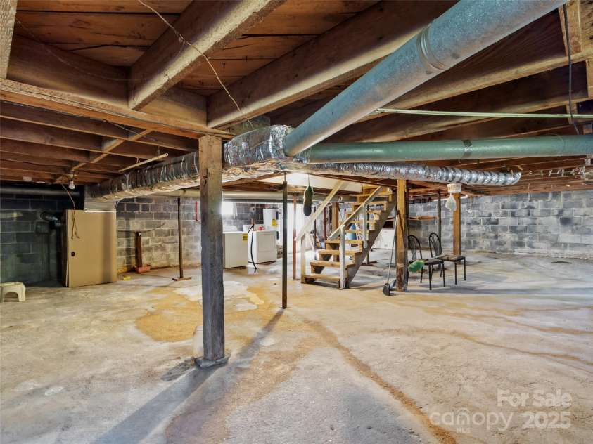 43 Charter Way, Burnsville, NC 28714.  MLS# CAR4256306, YatesRealty ID 11763. Laundry in basement