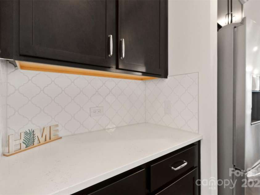 117 Carmine Court, Troutman, NC 28166.  MLS# CAR4269982, YatesRealty ID 11774. Coffee bar/Additional cabinet space 