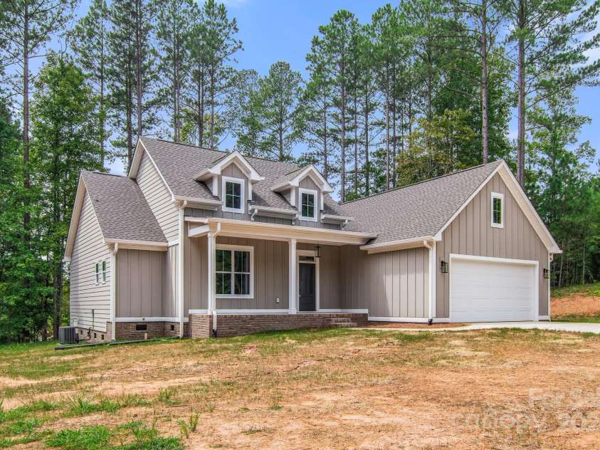 121 Arboretum Way, Shelby, NC 28152.  MLS# CAR4133112, YatesRealty ID 11777. Low-maintenance exterior constructed with durable fiber cement, totally finished garage and lovely front porch