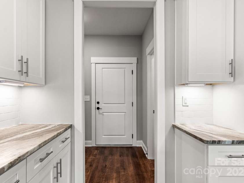 121 Arboretum Way, Shelby, NC 28152.  MLS# CAR4133112, YatesRealty ID 11777. View from kitchen into drop zone area and garage entrance