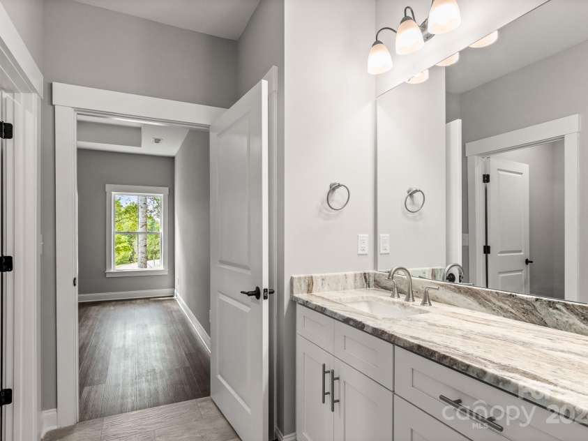 121 Arboretum Way, Shelby, NC 28152.  MLS# CAR4133112, YatesRealty ID 11777. View into primary bedroom from attached bath