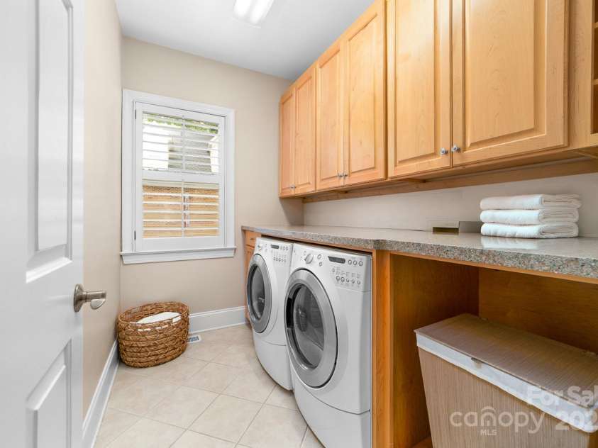 7220 Swansea Lane, Cornelius, NC 28031.  MLS# CAR4255179, YatesRealty ID 11778. Main Level Laundry Room