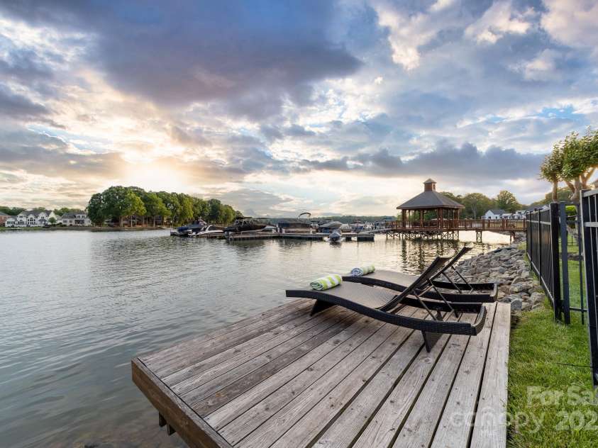 7220 Swansea Lane, Cornelius, NC 28031.  MLS# CAR4255179, YatesRealty ID 11778. Private swim dock & paddle sport launch.