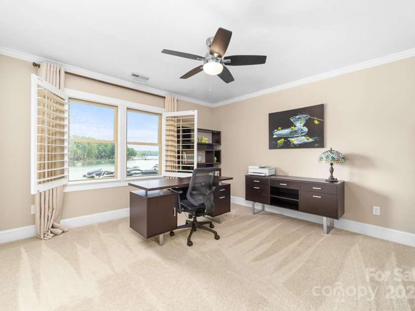 7220 Swansea Lane, Cornelius, NC 28031.  MLS# CAR4255179, YatesRealty ID 11778. Upper-Level Lakeside Bedroom