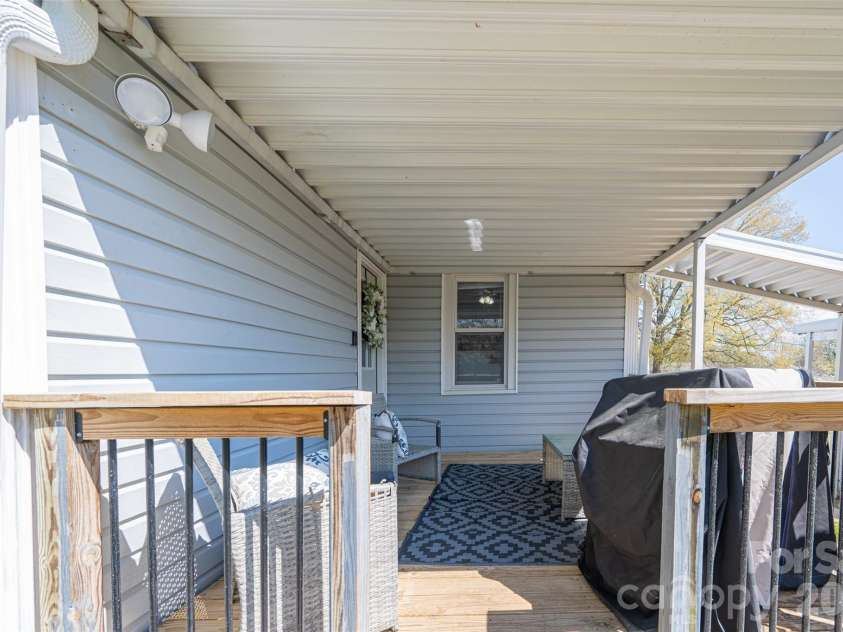 206 Bates Avenue, Cherryville, NC 28021.  MLS# CAR4358580, YatesRealty ID 11779. Back porch deck