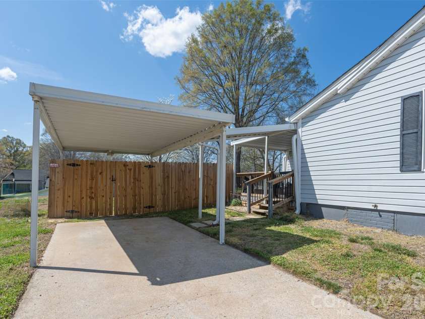 206 Bates Avenue, Cherryville, NC 28021.  MLS# CAR4358580, YatesRealty ID 11779. Covered carport attached with breezeway