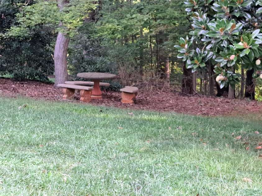 123 Softwind Lane, Concord, NC 28025.  MLS# CAR4296194, YatesRealty ID 1178. Back yard with 