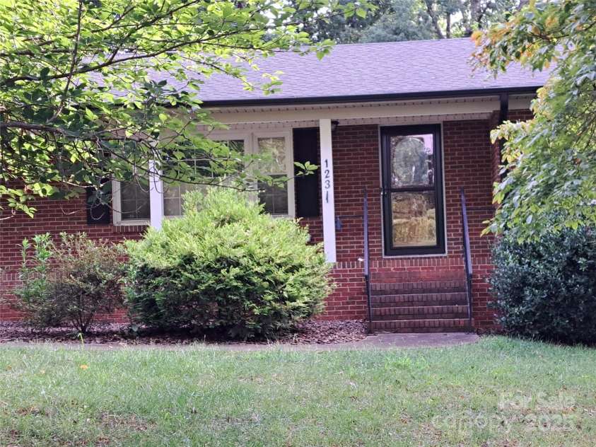 123 Softwind Lane, Concord, NC 28025.  MLS# CAR4296194, YatesRealty ID 1178. Front