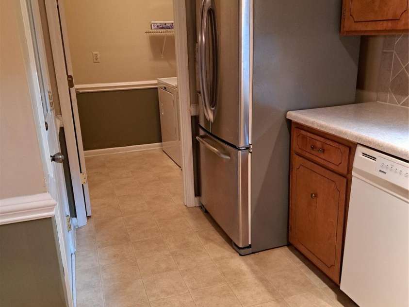 123 Softwind Lane, Concord, NC 28025.  MLS# CAR4296194, YatesRealty ID 1178. Kitchen opens to laundry room - all appliances remain