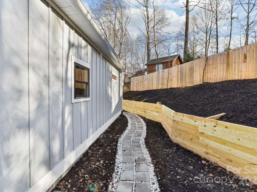 129 Oak Apple Lane, Hendersonville, NC 28792.  MLS# CAR4205968, YatesRealty ID 1178. Back of home