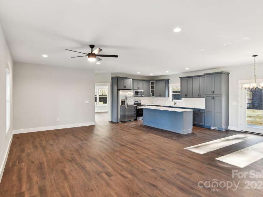 129 Oak Apple Lane, Hendersonville, NC 28792.  MLS# CAR4205968, YatesRealty ID 1178. Kitchen and living room