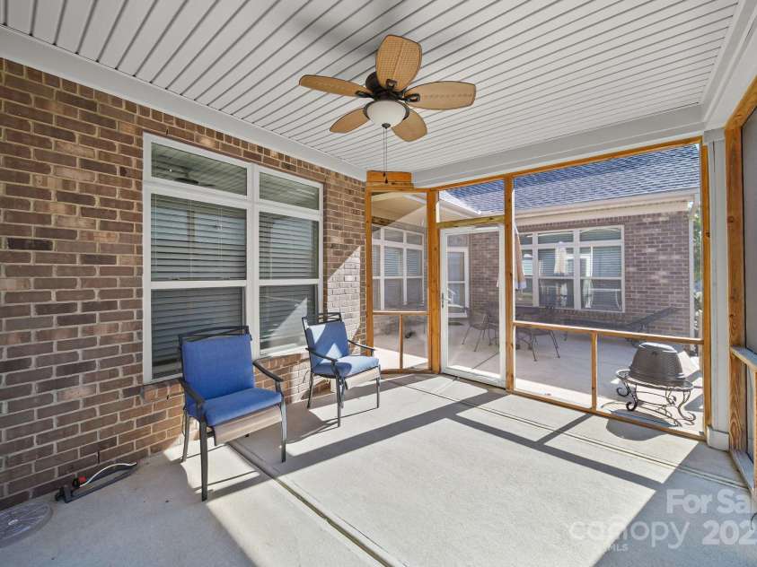 4516 Ideal Way, Harrisburg, NC 28075.  MLS# CAR4325804, YatesRealty ID 1178. The Screened Porch off The Patio makes a Great Lounge Area to Relax