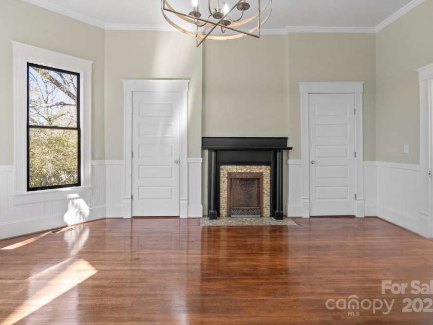 85 Grove Avenue, Concord, NC 28025.  MLS# CAR4224085, YatesRealty ID 11785. Fireplace in Primary