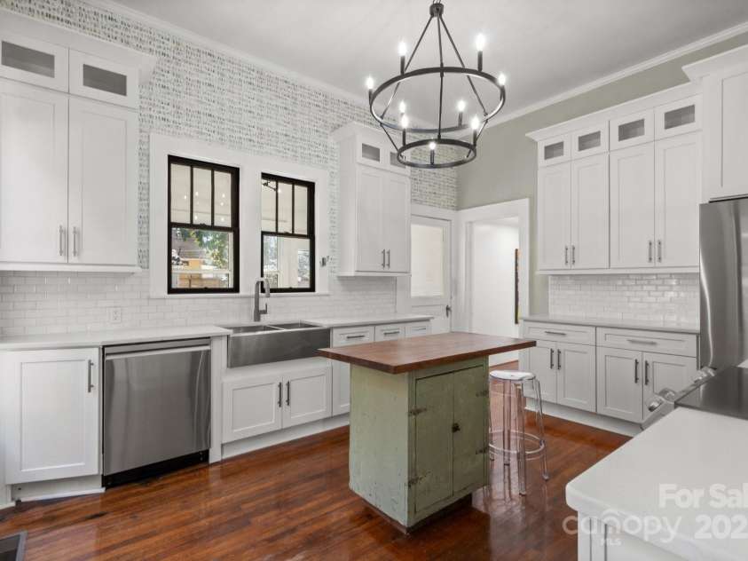 85 Grove Avenue, Concord, NC 28025.  MLS# CAR4224085, YatesRealty ID 11785. Kitchen w/style and weathered antique center island