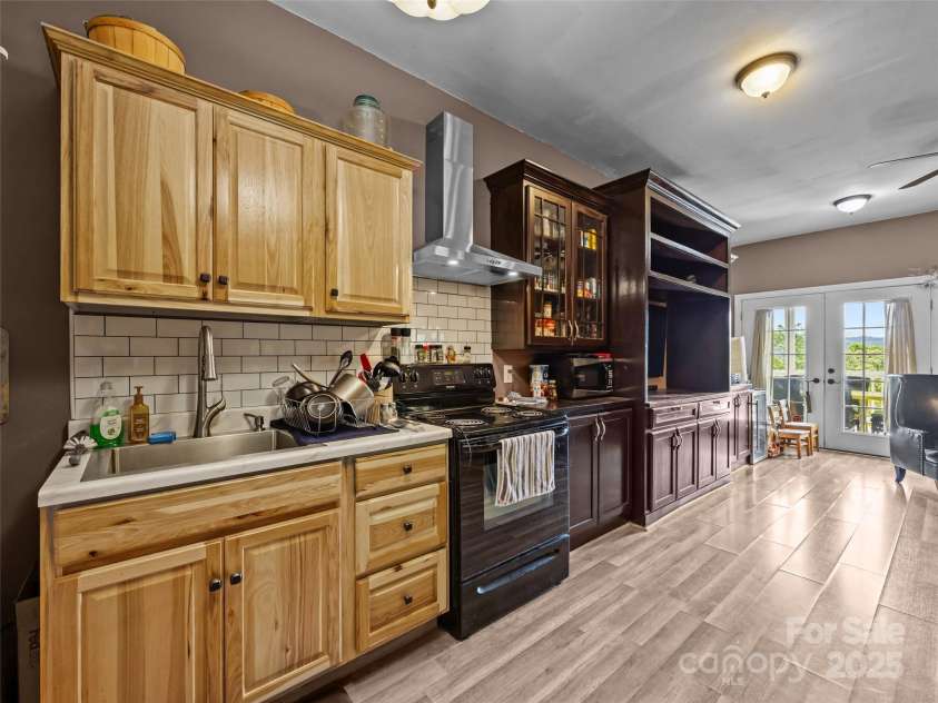 410 Lamp Post Drive, Zirconia, NC 28790.  MLS# CAR4253255, YatesRealty ID 11787. Basement