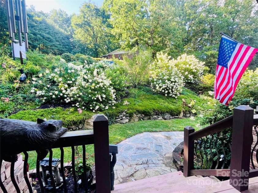 410 Lamp Post Drive, Zirconia, NC 28790.  MLS# CAR4253255, YatesRealty ID 11787. Hydrangeas in full bloom!