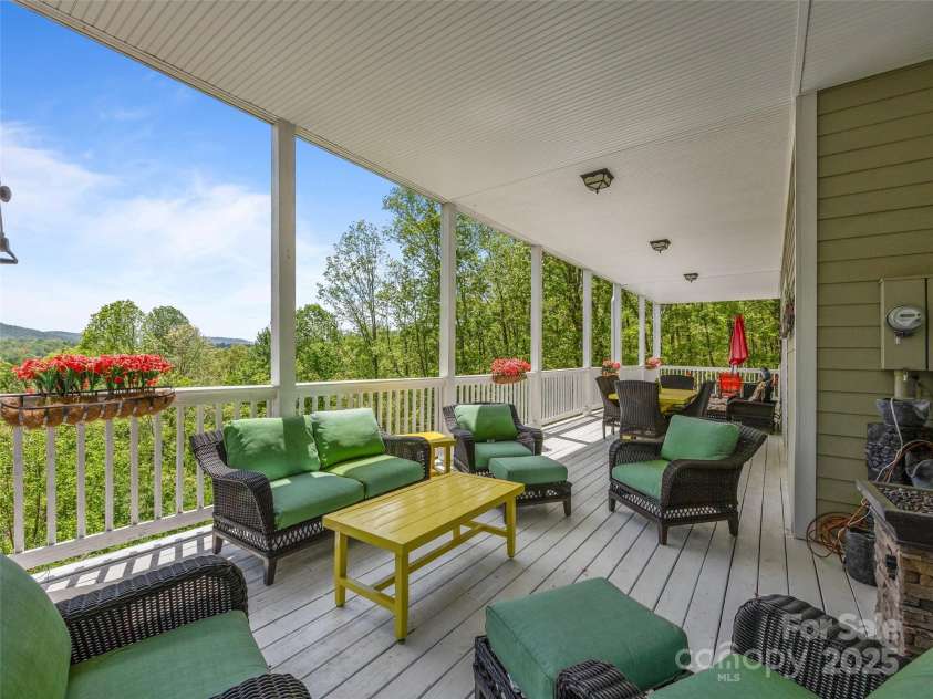 410 Lamp Post Drive, Zirconia, NC 28790.  MLS# CAR4253255, YatesRealty ID 11787. Lower level porch