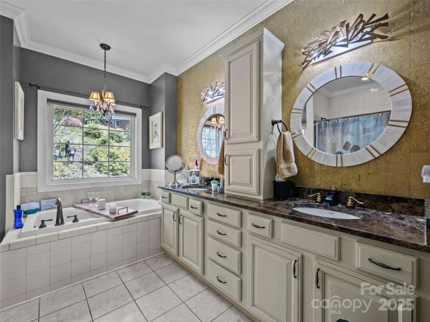 410 Lamp Post Drive, Zirconia, NC 28790.  MLS# CAR4253255, YatesRealty ID 11787. Primary bath
