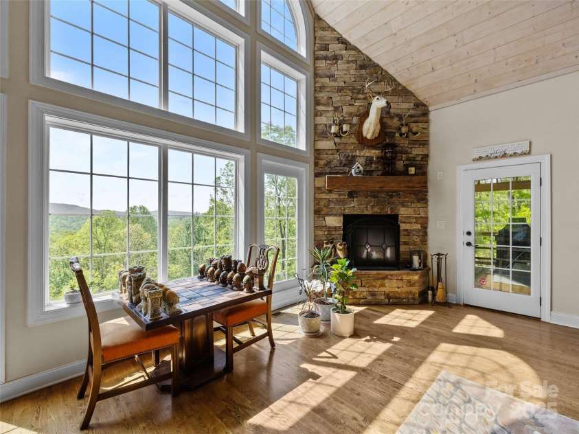 410 Lamp Post Drive, Zirconia, NC 28790.  MLS# CAR4253255, YatesRealty ID 11787. Stone gas fireplace
