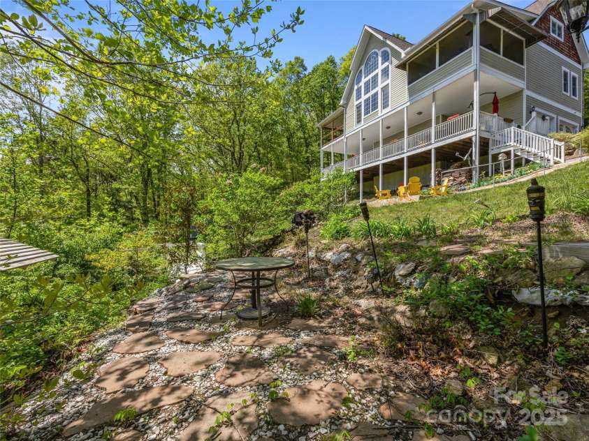 410 Lamp Post Drive, Zirconia, NC 28790.  MLS# CAR4253255, YatesRealty ID 11787. View from lower patio